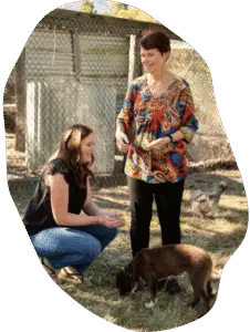 Quad Care disability support worker assisting NDIS participant on the Sunshine Coast