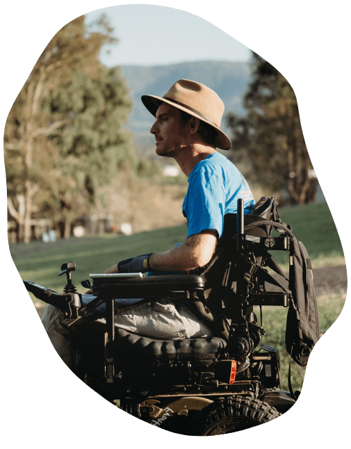 Person in an electric wheelchair in the community