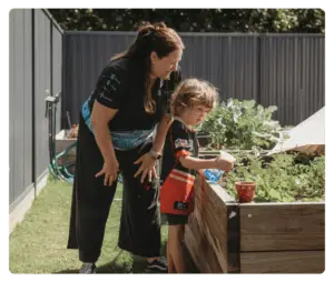 Child participating in an occupational therapy session with a Quad Care therapist
